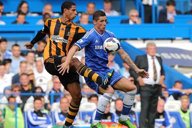 Hull City's Curtis Davies (left) and Chelsea's Fernando Torres battle for the ball during the Barclays Premier League match at Stamford Bridge, London.