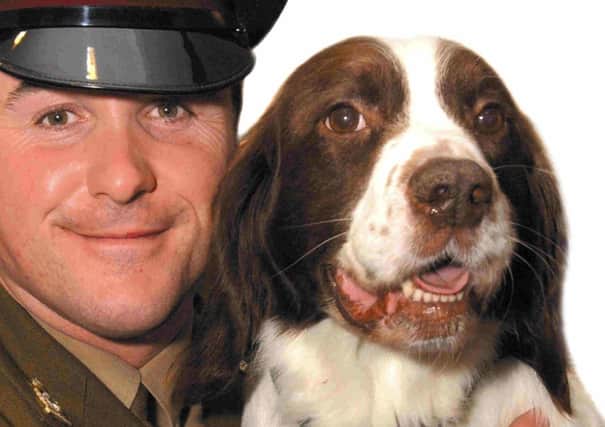 Buster with handler Sergeant Danny Morgan