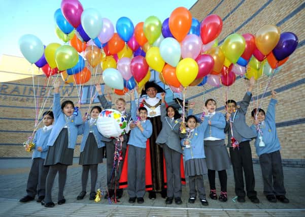 Lord Mayor of Bradford Cllr Khadim Hussain with children at the opening of the Rainbow Primary School