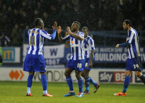 GOING THROUGH: Sheffield Wednesday's players' celebrate against Macclesfield Town last night. Picture: Bruce Rollinson.