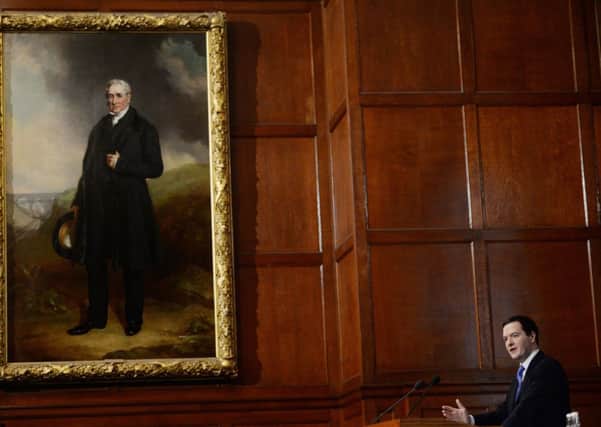 Chancellor George Osborne addressing the Open Europe conference in London, under a portrait of civil engineer George Stephenson