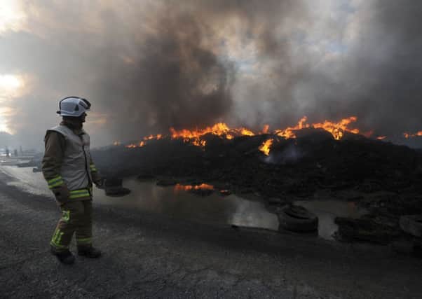 Peter Hudson of North Yorkshire Fire and Rescue Service surveys the scene at the recycling plant at Sherburn-in-Elmet