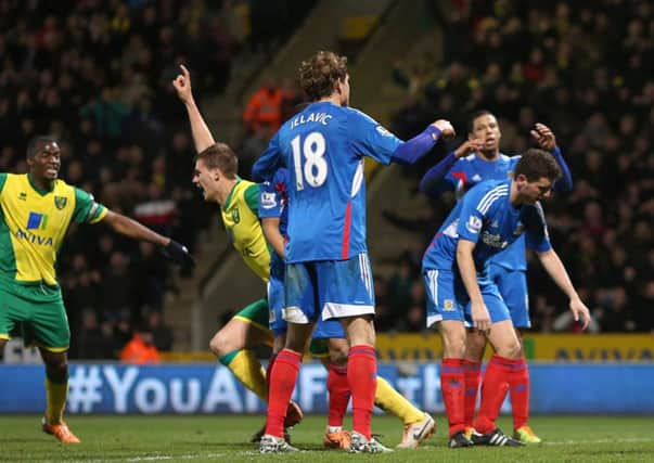 Norwich City's Ryan Bennett (second left) celebrates scoring.