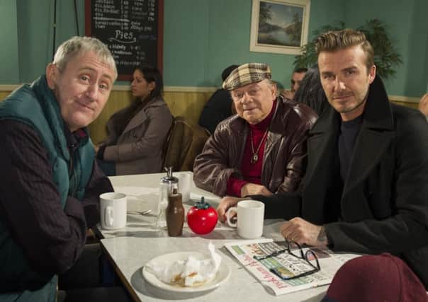 David Beckham (right)  as he joins Sir David Jason (centre) and Nicholas Lyndhurst, as a guest in a special Only Fools And Horses sketch