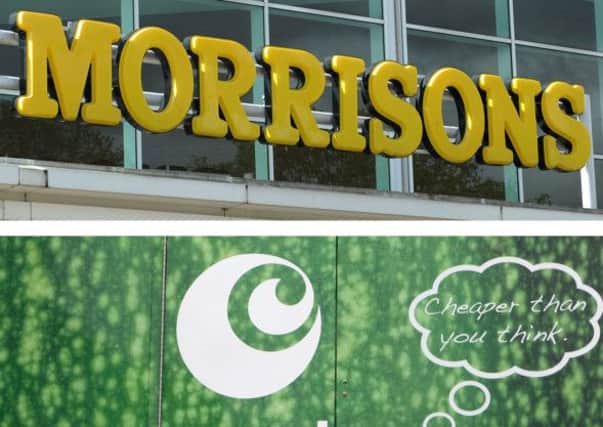 Morrisons and Ocado signs