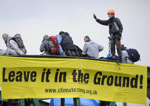 Protesters in 2008 on a train carrying coal to the Drax power station in North Yorkshire after they stopped it just south of Drax.