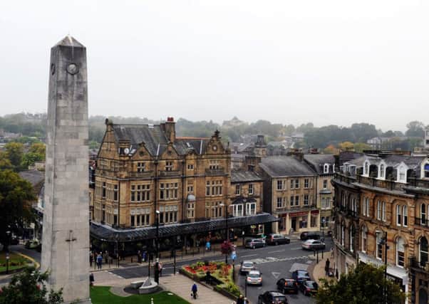 A  view of Harrogate showing the Cenotaph and Bettys