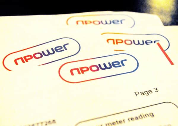 Npower has claimed bills in the UK are high because the country's "old and draughty" houses waste so much gas and electricity.