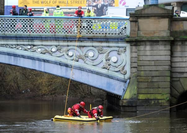 Police search the River Aire at Leeds Bridge, Leeds