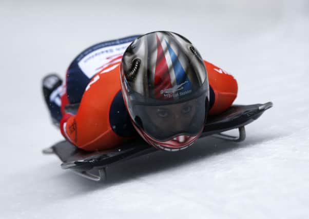 Britain's Shelley Rudman speeds down the track during her first run of the women's Skeleton World Cup race in Koenigssee, southern Germany. (AP Photo/Matthias Schrader)