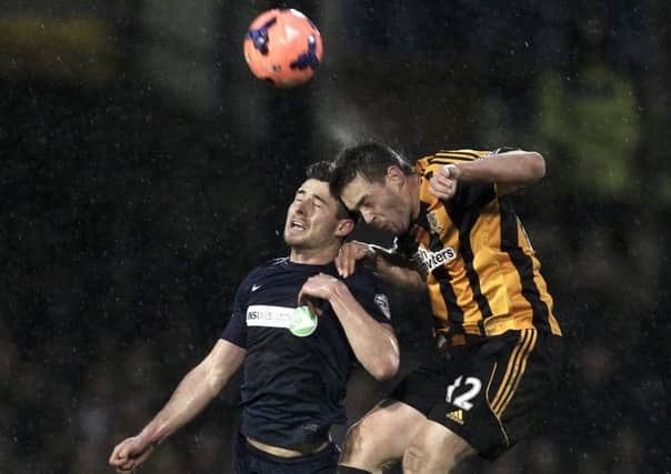 Southend United's Ryan Leonard battles for the ball with Hull Citys Matty Fryatt