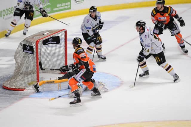 ON OUR WAY: Sheffield Steelers' Jonathan Phillips scores against Nottingham Panthers in a 5-2 win at the Motorpoint Arena on Saturday night. Picture: Dean Woolley.