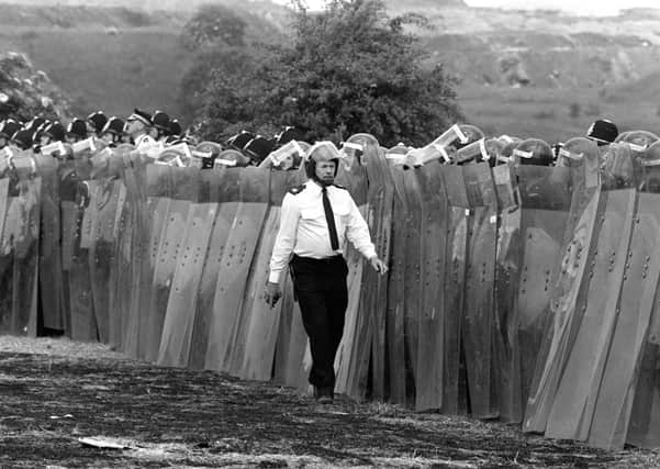 1984: 
Riot police line up at Orgreave in South Yorkshire