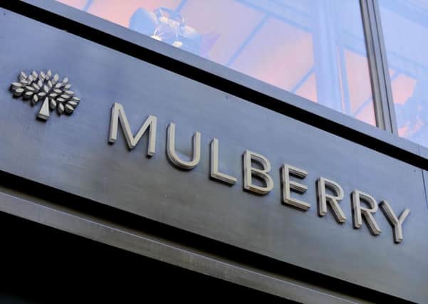 Mulberry warned profits would "substantially" miss expectations after a tumble in UK sales over Christmas.