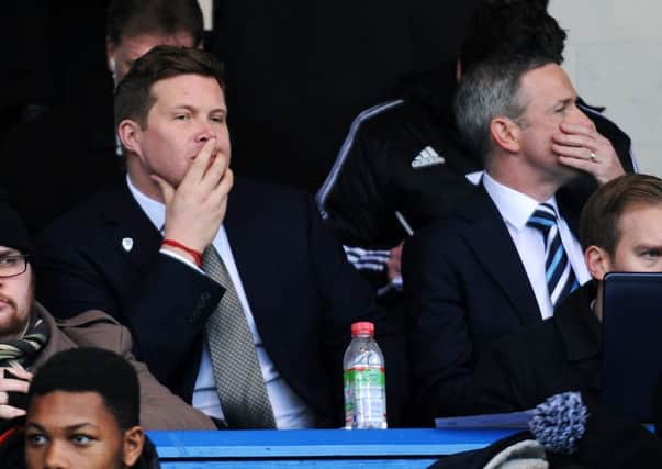 David Haigh in the box at the Rochdale FA Cup clash on January 4, with acting chief executive Paul Hunt.