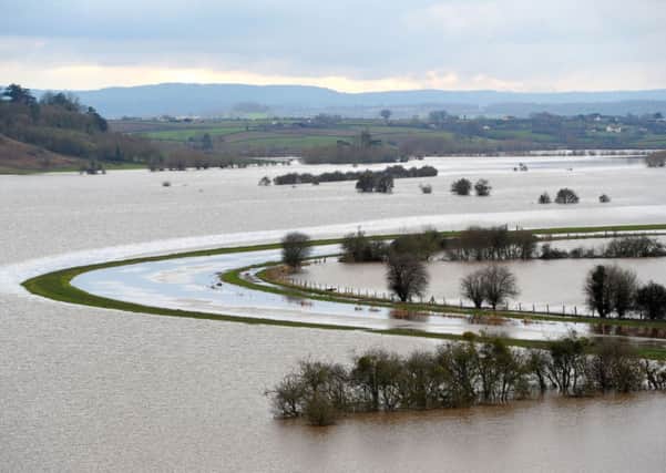 The flooded River Parrett in Burrowbridge, Somerset, as flooding persists on the levels.