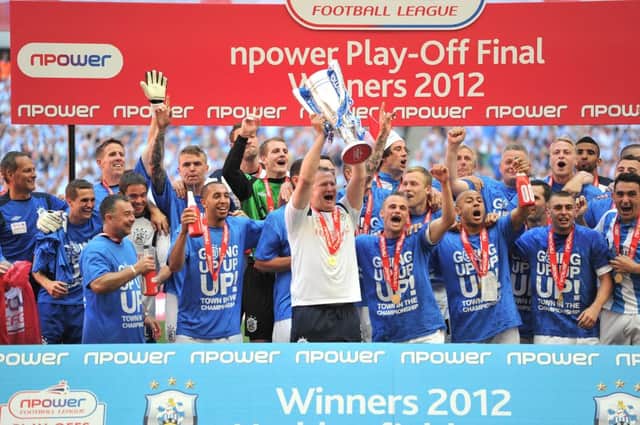 Simon Grayson celebrates with the League One Play-Off Trophy during the npower League One, Playoff Final at Wembley Stadium in 2012