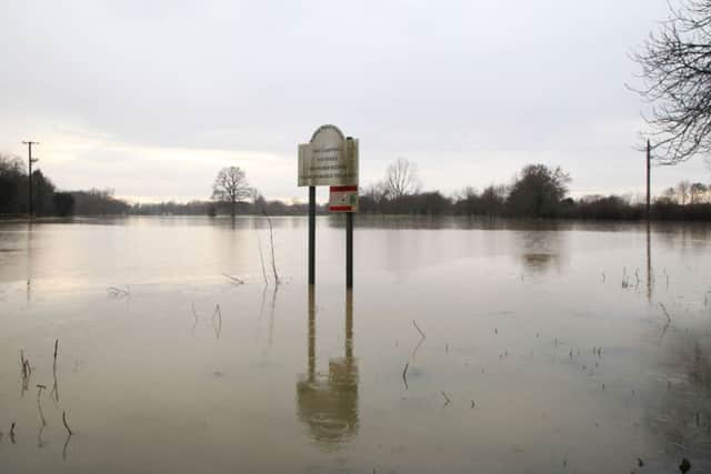 Residents are transported from the village of Muchelney in Somerset, after it was cut off by flooding.