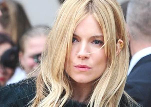 Sienna Miller launched an emotional attack on "titillating" press reports of her relationship with Bond actor Daniel Craig,  as she revealed to the hacking trial that it was "a very brief encounter".