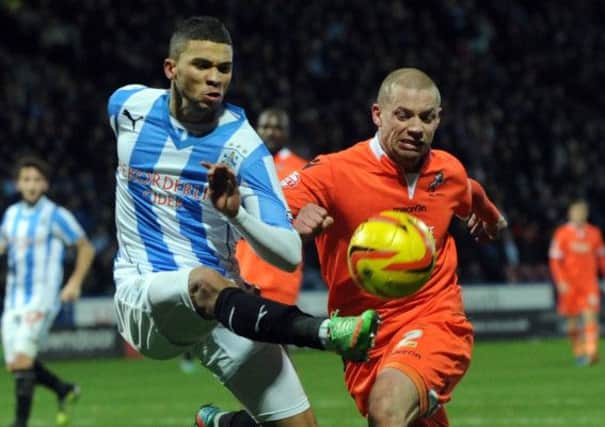 Nahki Wells moved from Bradford City to Huddersfield in one of the big transfer deals of the month.