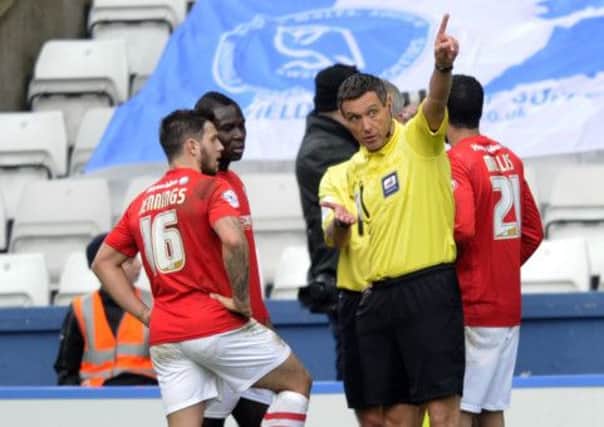 Reds'  Emmanuel Frimpong sees red.