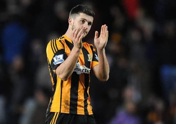 Hull City's Shane Long applauds the fans after the final whistle of the Barclays Premier League match at the KC Stadium, Hull.