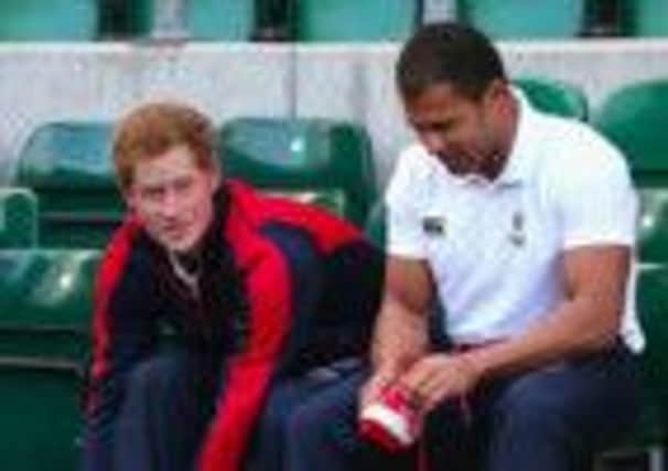 Prince Harry with Jason Robinson, who is a director of  X Blades UK.