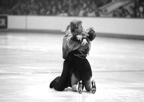Jayne Torvill and Christopher Dean skating and winning gold for ice dancing at the Sarajevo Olympics with their Bolero routine.