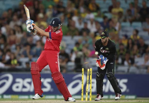 England's Stuart Broad is clean bowled during their T20 International cricket match against Australia in Sydney. (AP Photo/Rob Griffith)