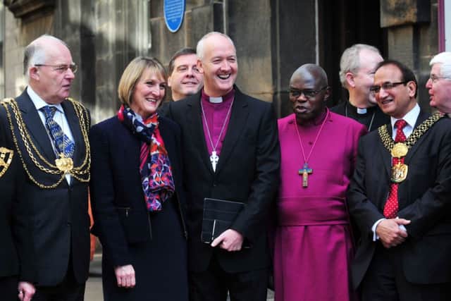The Rt Revd Nick Baines, new Bishop of Leeds, with wife Linda and the Archbishop of York, Dr John Sentamu at Holy Trinity Church, Leeds. Picture By Simon Hulme