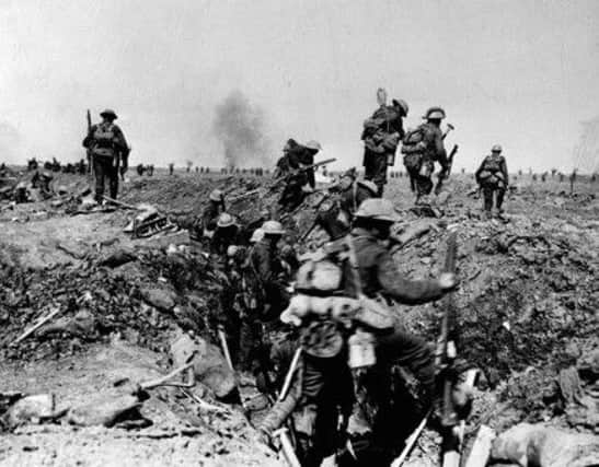 British Troops going over the top to support an attack by XIV Corps on Morval during the Battle of the Somme in the 1914-1918 War