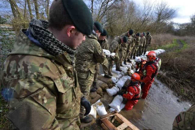 Reserve soldiers of 7 Battalion The Rifles, deployed alongside members of Berkshire Fire and Rescue Service