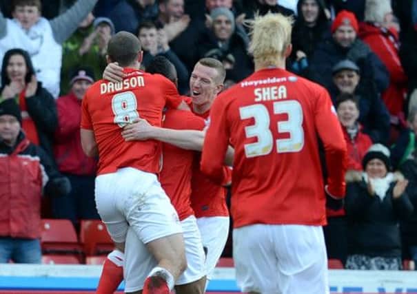 Barnsley's open goal scorer against Ipswich Town, Chris O'Grady (centre), is congratulated by teammnates.