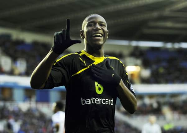 Owls' Benik Afobe salutes his first goal for Wednesday.