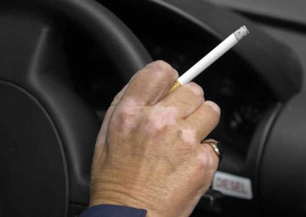 Smoking in cars in the presence of children is to be outlawed in England by the end of the year