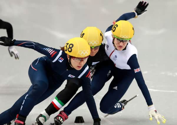 Elise Christie collides with her rivals in the 500m short track final.