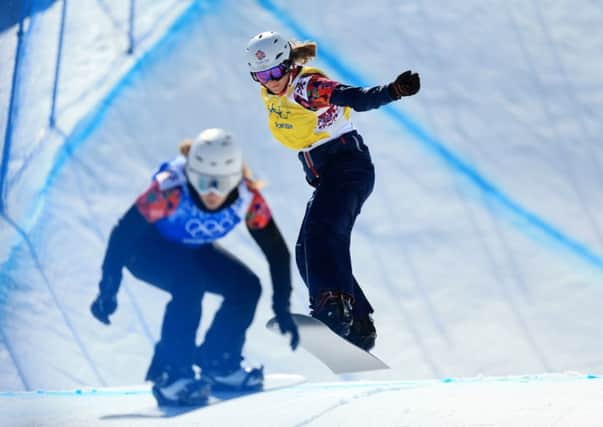 CLOSE CALL: Leeds's Zoe Gillings competes during the Snowboard Cross in Sochi yesterday. Picture: Mike Egerton/PA.
