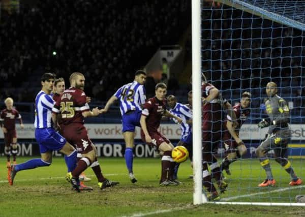 UNLUCKY: Owls go close to scoring against Derby County at Hillsborough last night. Picture: Steve Ellis.