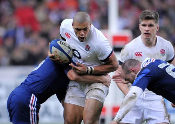 BIG DATE: England's Luther Burrell (with ball) is excited about battling with Ireland's Brian O'Driscoll.