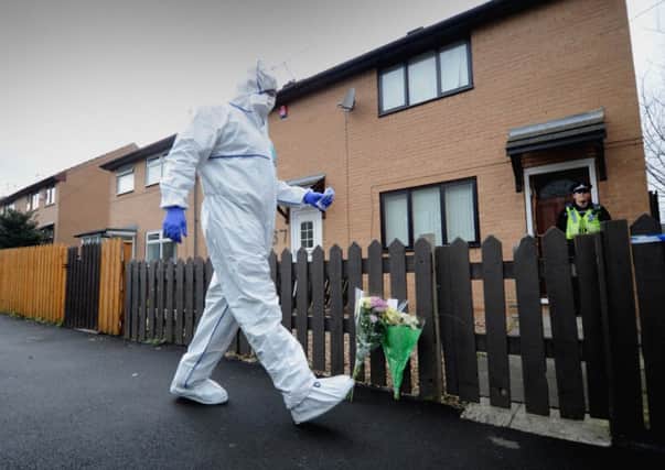 Forensic officers arrive at the house on Delamere Street, Bradford. Picture by Simon Hulme