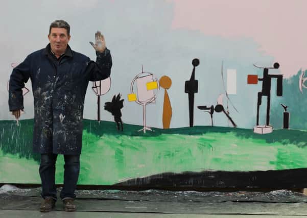 Bruce McLean with one of his works