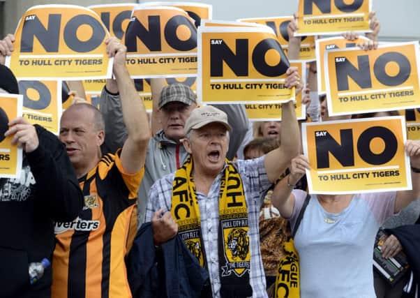 Hull City fans protesting against the change of name by the club's owners before the match against Norwich City