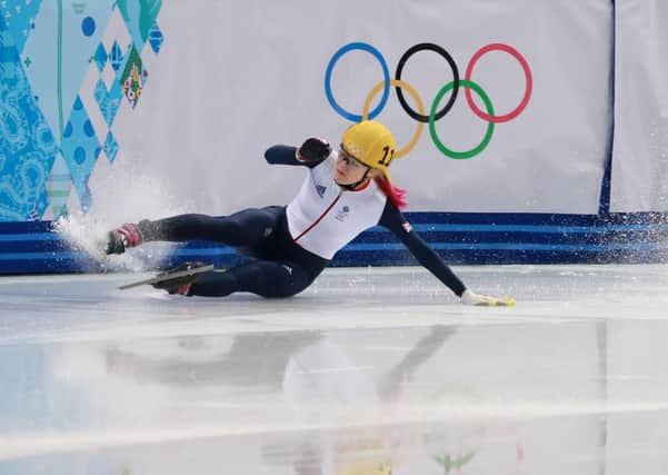 Great Britain's Elise Christie crashes out in her 1,000m Short Track Semi Final at the Iceberg Skating Palace during the 2014 Sochi Olympic Games in Sochi, Russia. (Picture: David Davies/PA Wire).