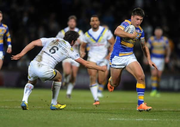 COMING THROUGH: Tom Briscoe scores his try against Warrington. Picture: Steve Riding.