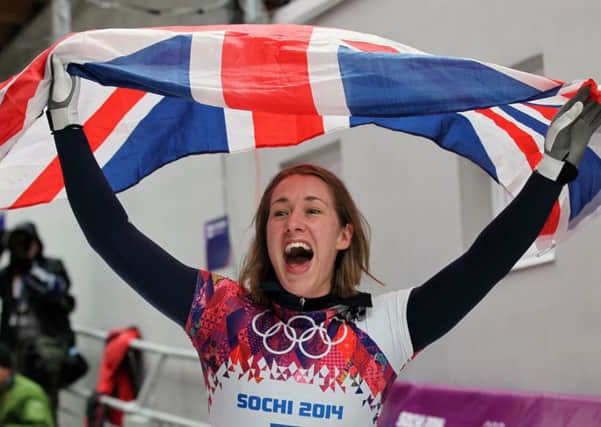 MEMORABLE: Great Britain's Lizzy Yarnold celebrates winning Gold in the Women's Skeleton Final in Sochi.