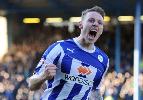 Sheffield Wednesday's Connor Wickham is to join Leeds on loan.