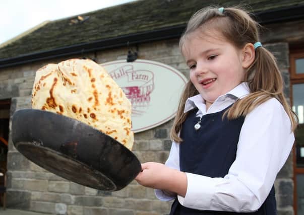 FLIPPING GREAT: Laura Tunningley gets in some practice at Blacker Hall Farm Shop.