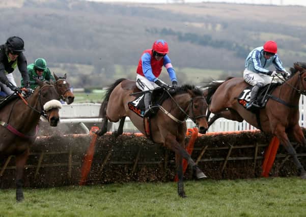 SAME AGAIN PLEASE: Quevega ridden by jockey Ruby Walsh on the way to victory in the OLBG Mares' Hurdle last year.