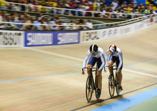 British Cycling of Great Britain's Jess Varnish leads Becky James on there way to bronze in the women's team sprint competition at the 2014 UCI Track Cycling World Championships in Cali, Colombia.