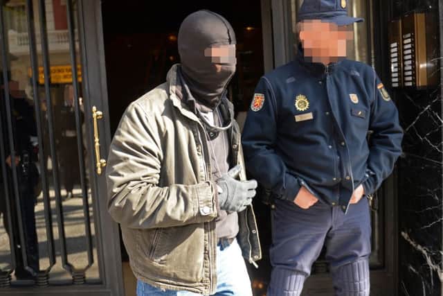London Police and Spanish counterparts raid a business property in Barcelona to target a boiler room investment fraud operation.